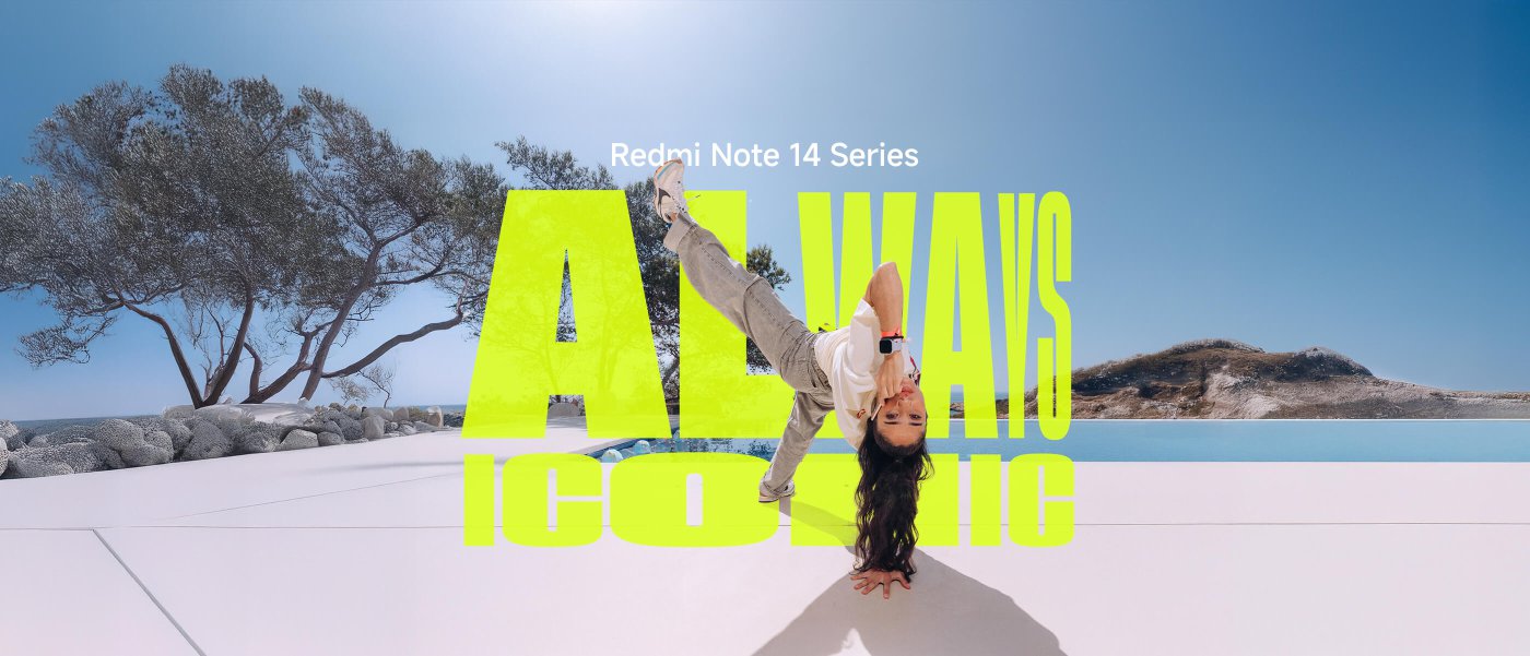 Vrouwen doen een handstand in de buitenlucht, met op de achtergrond een blauwe lucht, een zwembad en heuvels in de verte. De tekst toont "Redmi Note 14 Series" en "ALWAYS ICONIC".